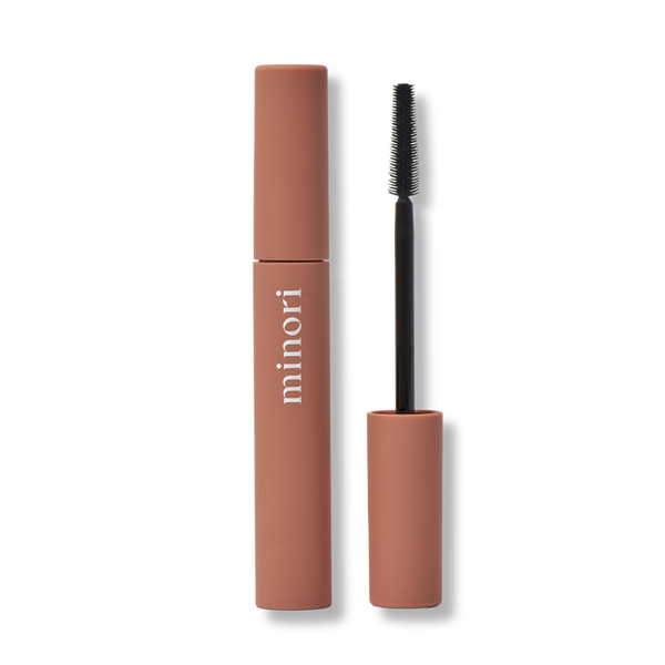 Minori Beauty Mother of Lashes natural mascara tube and precision brush on neutral background