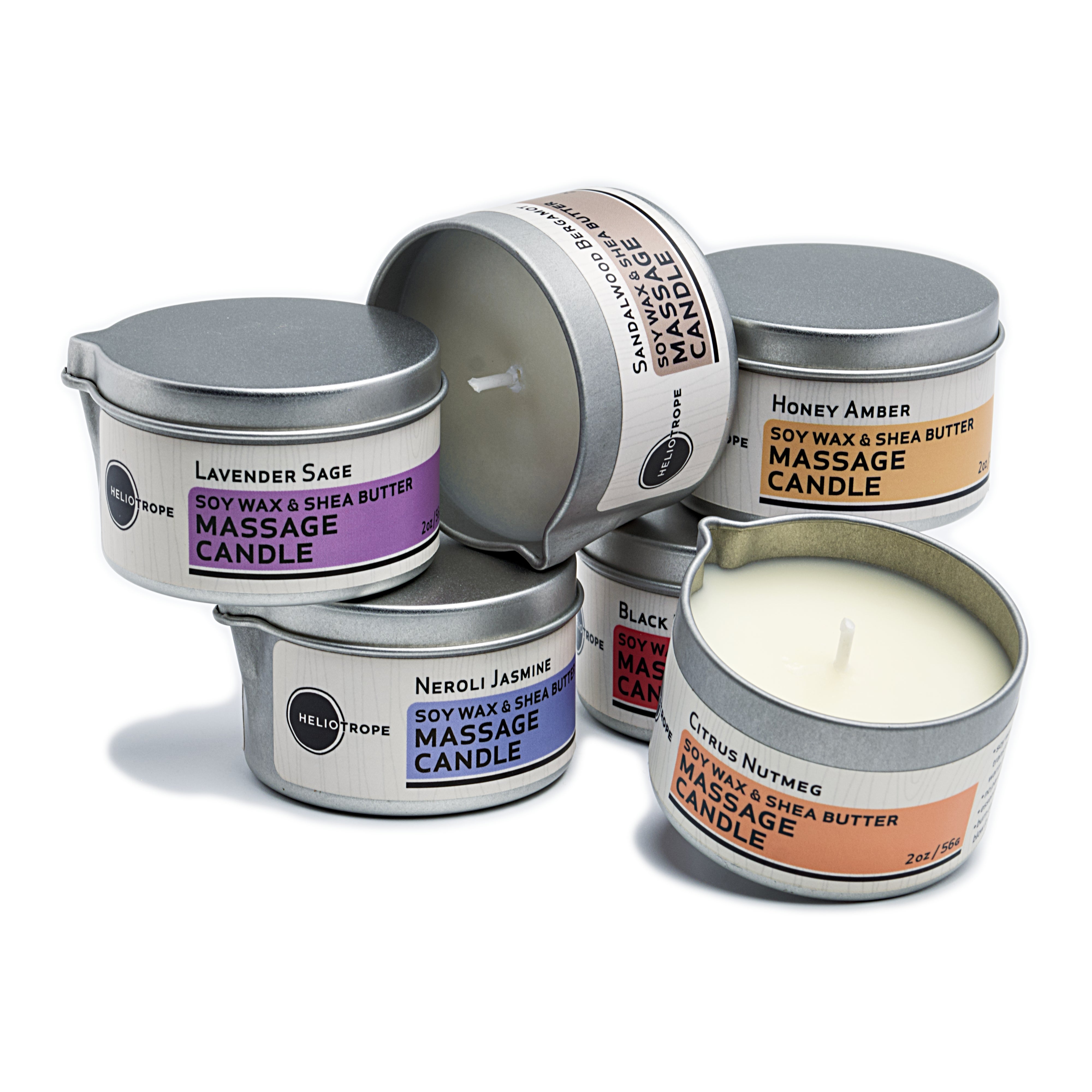 Stack of Heliotrope SF massage candles with pour spout showing warm melted oil