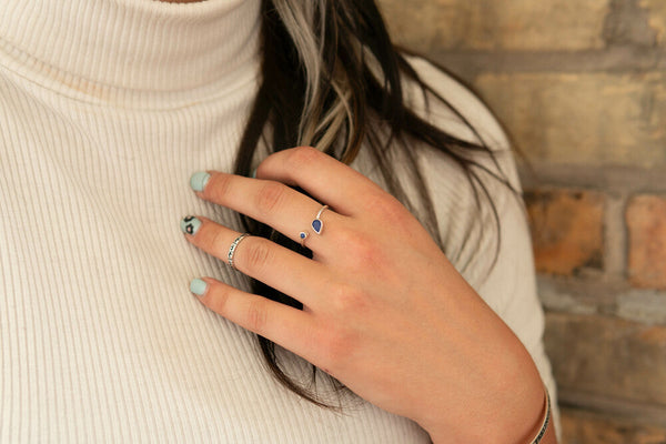 Medusa Lapis and Paisley Adjustable Sterling Silver Rings displayed together, ethically made by women artisans
