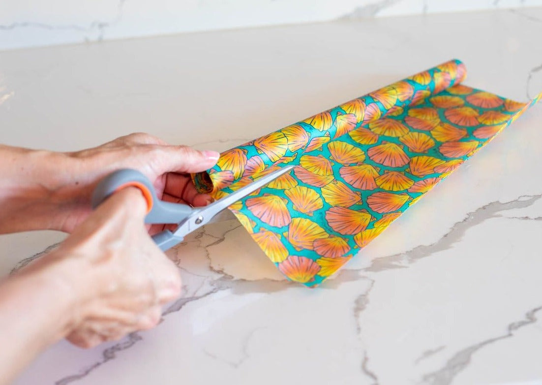 Beeswax wrap bulk roll cut and molded around food storage