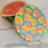 Close-up of Meli Wraps Beeswax Wrap Bulk Roll in Shells print texture and design