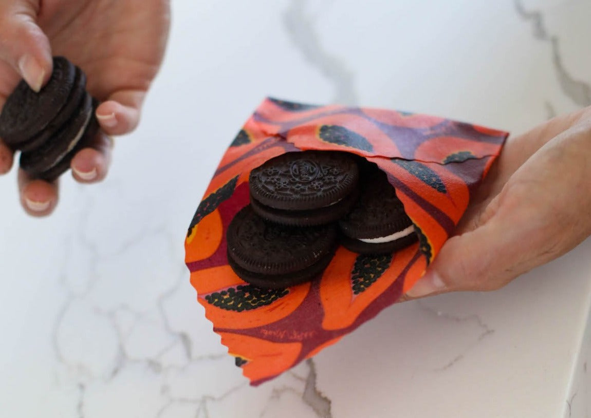 Meli Wraps beeswax food wraps in Purple Papaya print in three sizes