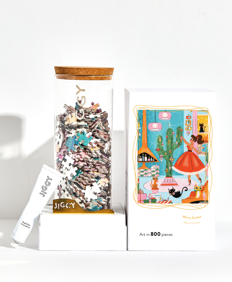 Jigsaw puzzle set with packaging on a white background