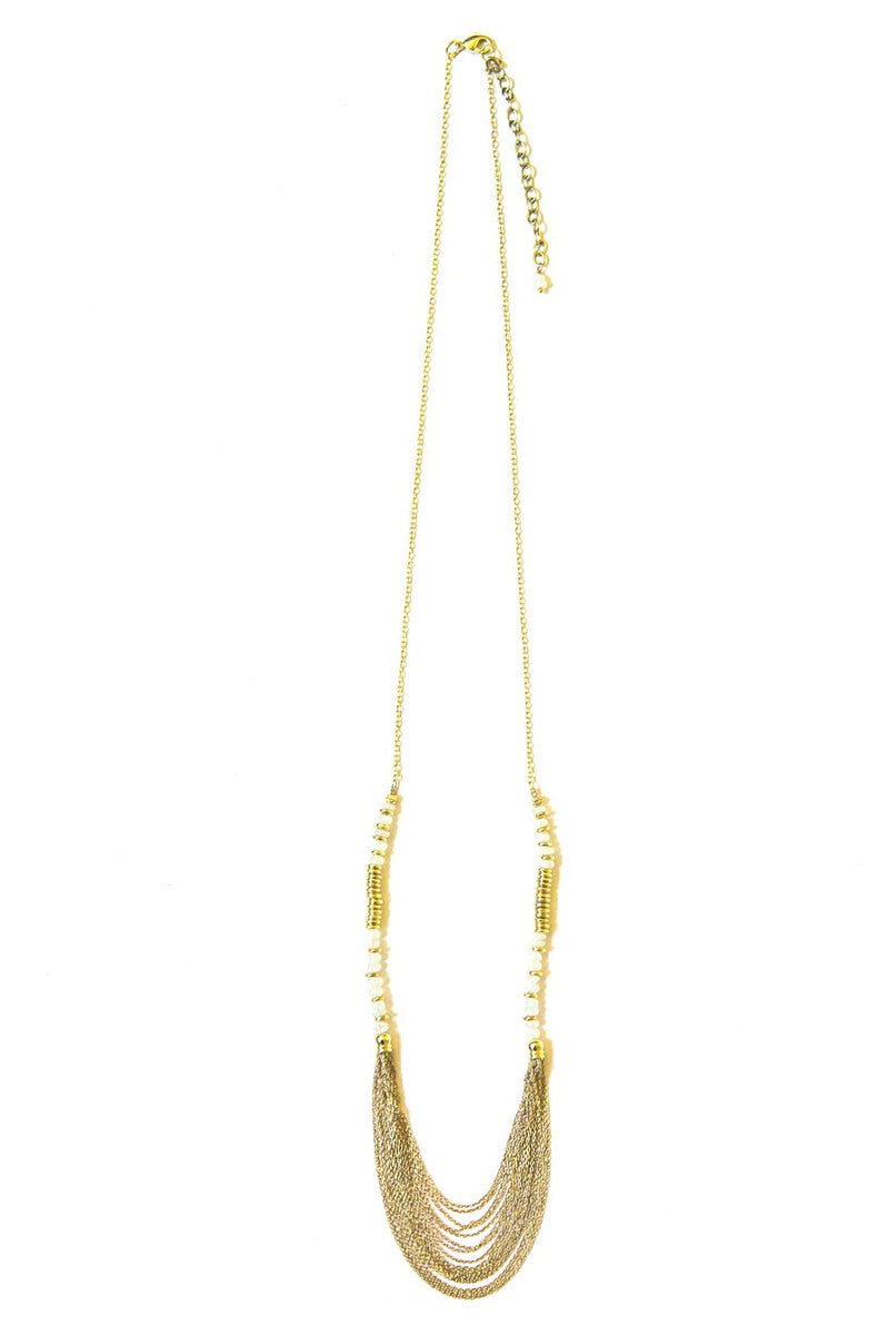 Detail shot of Meteor Shower Moonstone Necklace showing moonstone beads and brass disc accents by Fair Anita