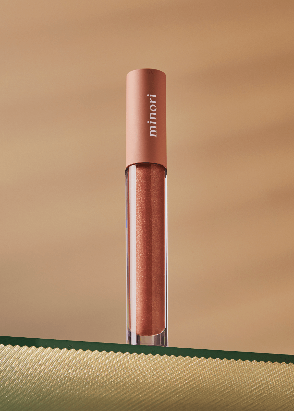 Minori Beauty Lip Gloss in Cozy shade — sheer tinted gloss with Vitamin E and Shea Butter