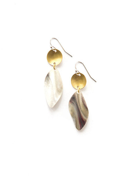 Mixed metal twist earrings styled and worn, showing size and mixed silver and brass tones