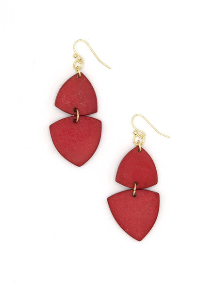 Flat lay of Fair Anita Modern Poppy Dangle Earrings — sustainable, fair trade statement earrings in poppy red