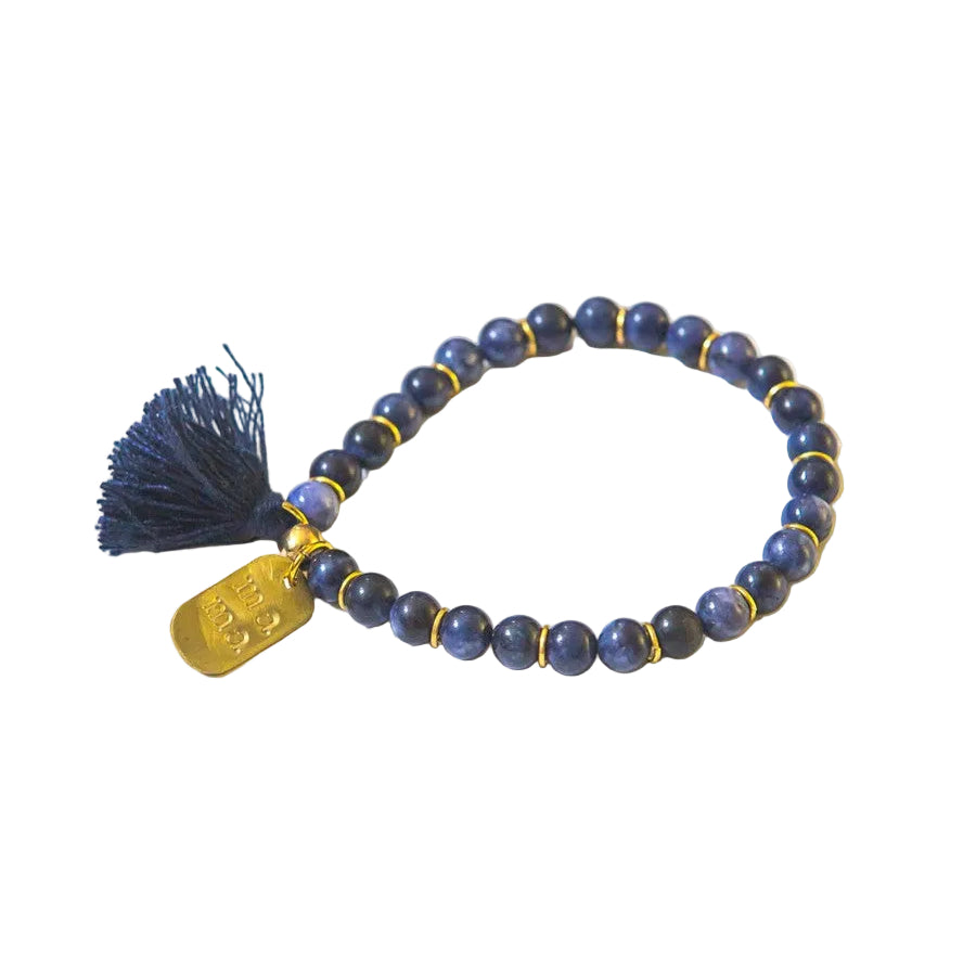 Dark blue sodalite beaded elastic bracelet with tassel and hand-stamped mama pendant by Fair Anita