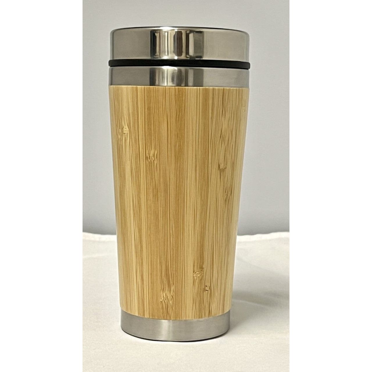 Our sustainable Bamboo Travel Mug is perfect for eco-conscious consumers. It's insulated, reusable, and ethically sourced. Order now and enjoy your favorite beverages on the go.