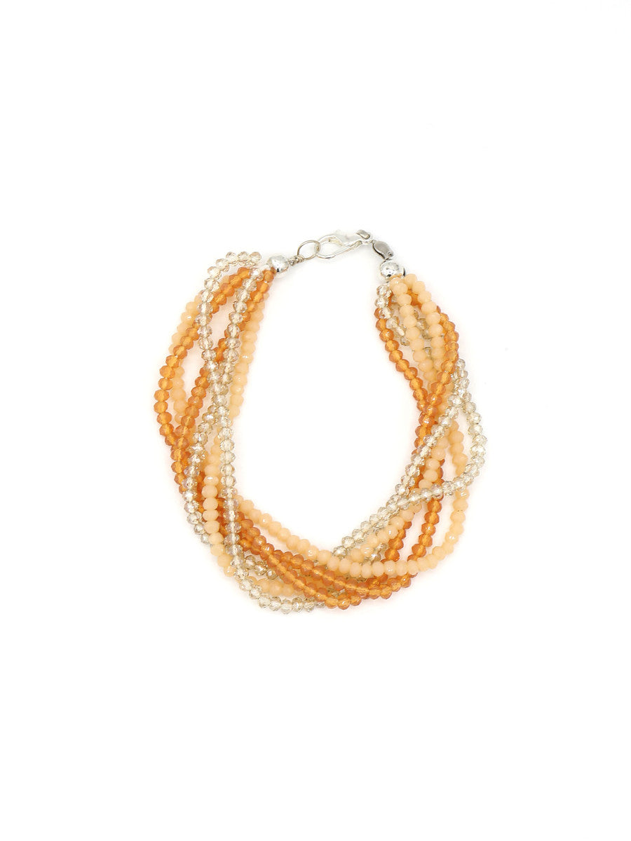 Peachy Keen multistrand sparkle bracelet with dainty glass beads, handcrafted by Fair Anita artisans in Peru