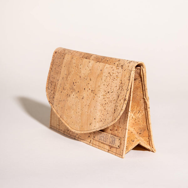 Cork clutch bag on a light beige background