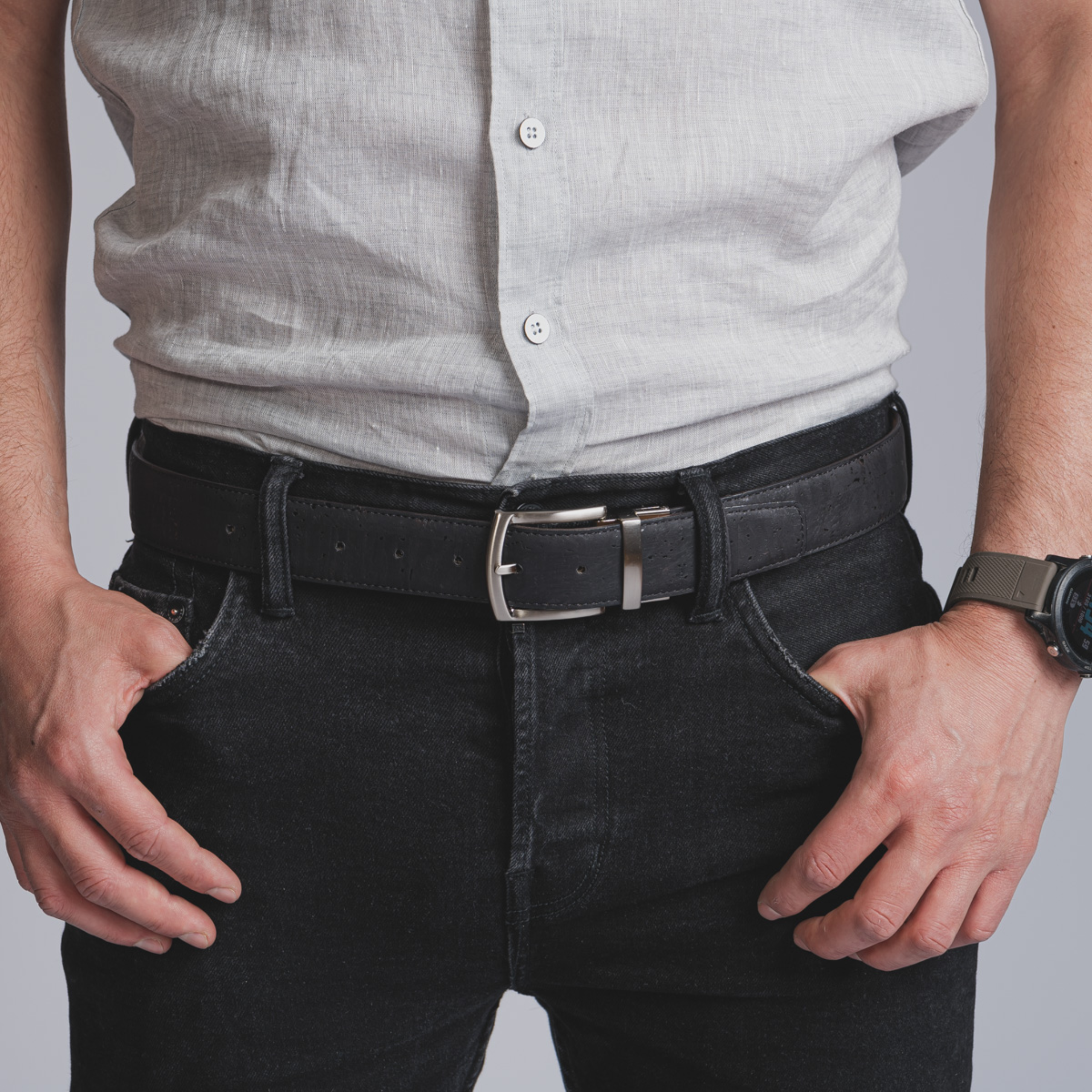 Versatile men's cork belt. Reversible brown and black design. Sustainable, vegan, and durable. Perfect for any occasion. Handmade in Portugal. Elevate your style. Shop now!