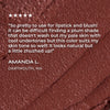 Close-up of a brown makeup product with a review text overlay.