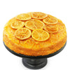 Sliced gluten-free orange cake showing moist sponge with fresh orange zest, baked by Andy Anand
