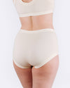 Beige high-waisted underwear on a white background