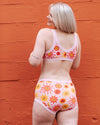 Flat lay of Thunderpants Luna y Sol Original women's underwear showing full sun and moon print pattern