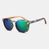 Sunglasses with colorful frame and blue-tinted lenses on a light gray background