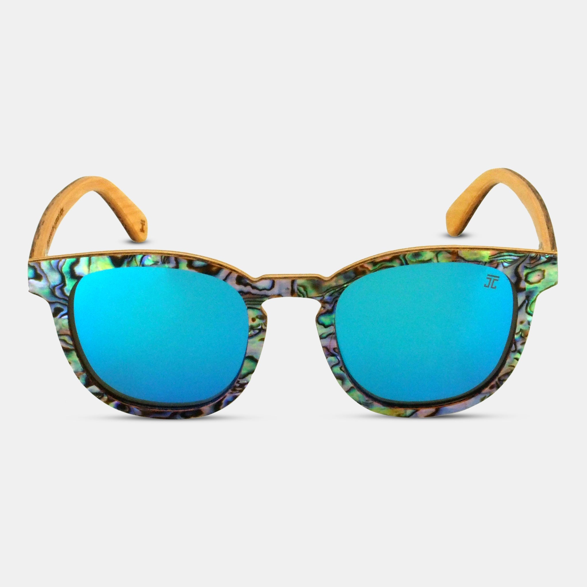 Sunglasses with blue lenses and a patterned frame on a white background