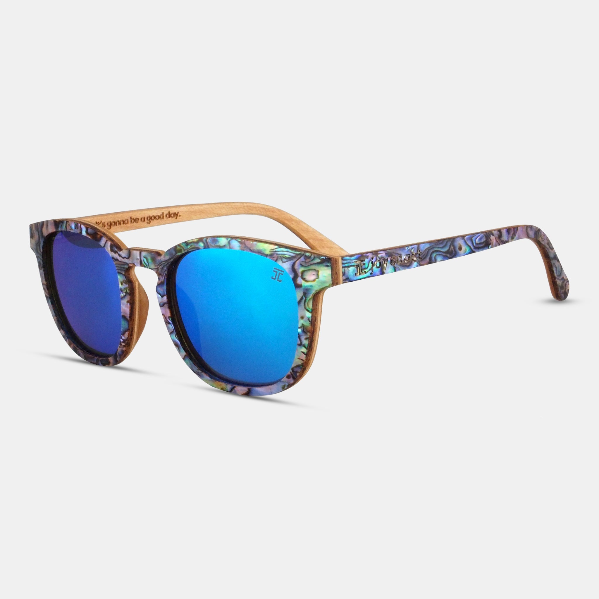 Sunglasses with blue lenses and floral patterned frame on a white background