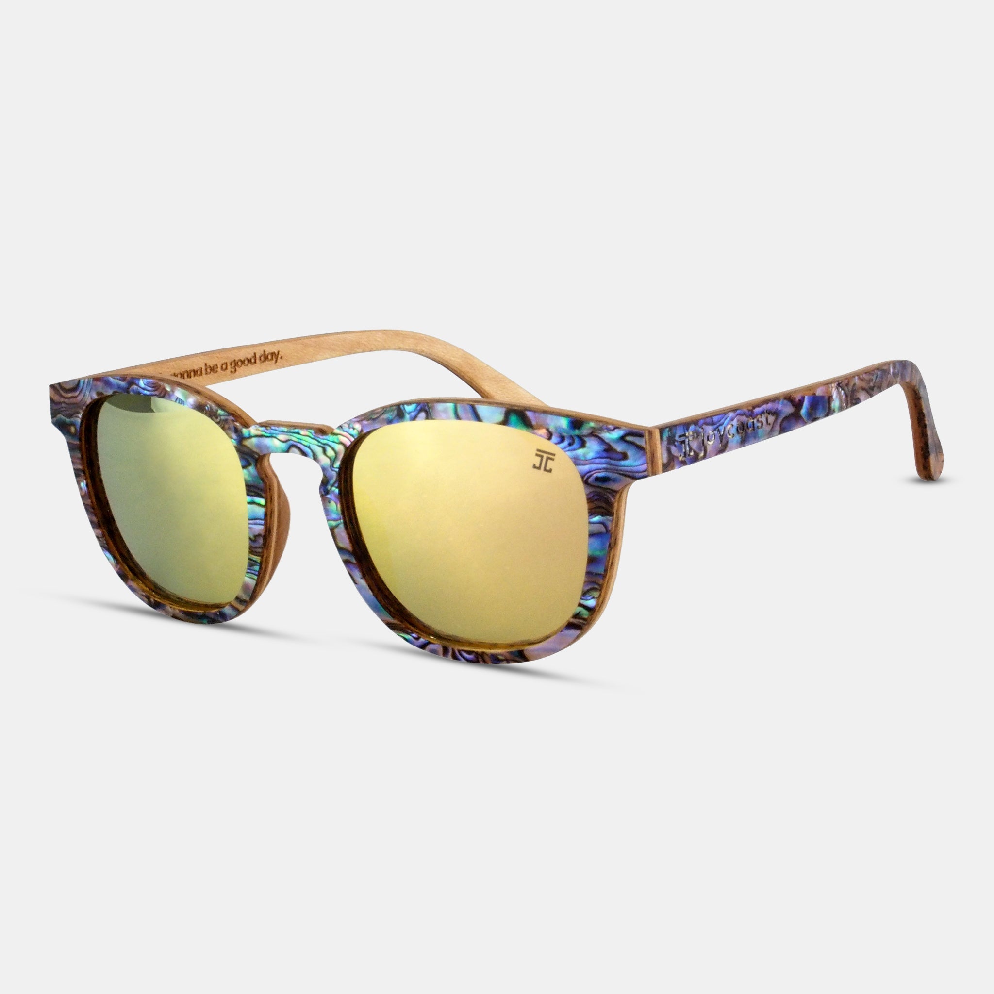 Sunglasses with colorful frame and yellow lenses on a light gray background