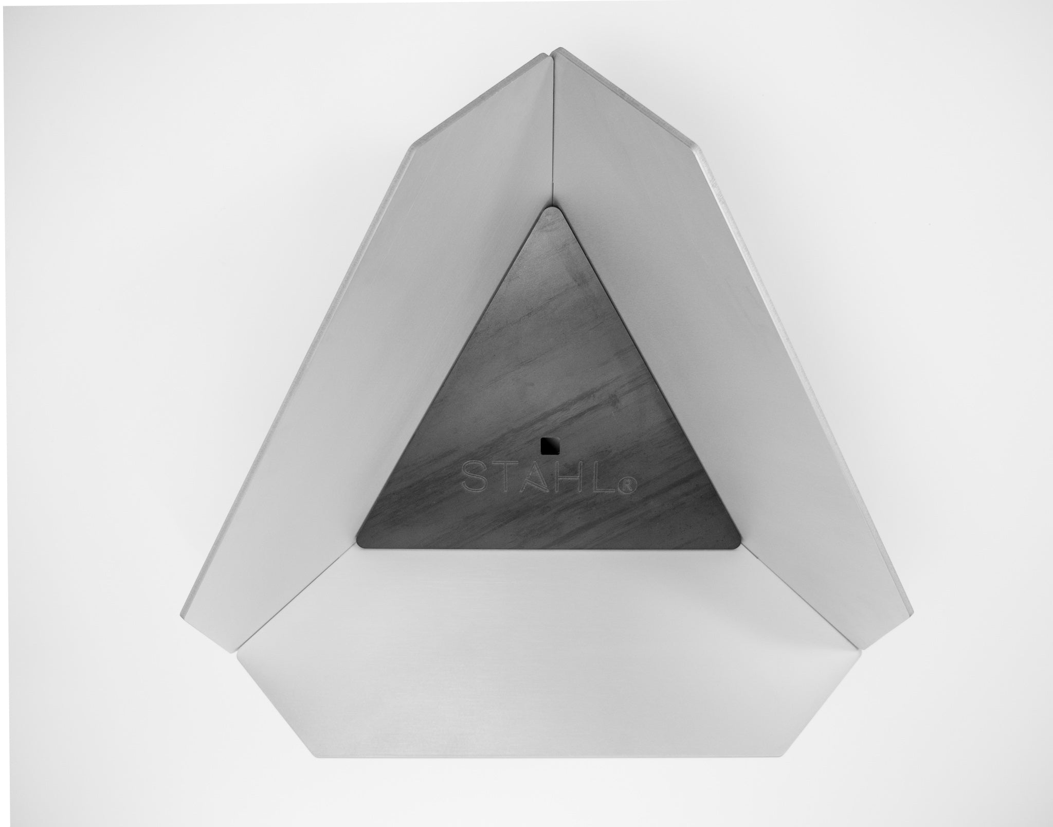Geometric wall light fixture with 'STahl' branding on a white background