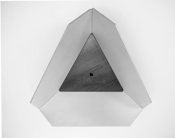 Geometric wall light fixture with 'STahl' branding on a white background