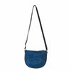 Blue crossbody bag with a black strap on a white background