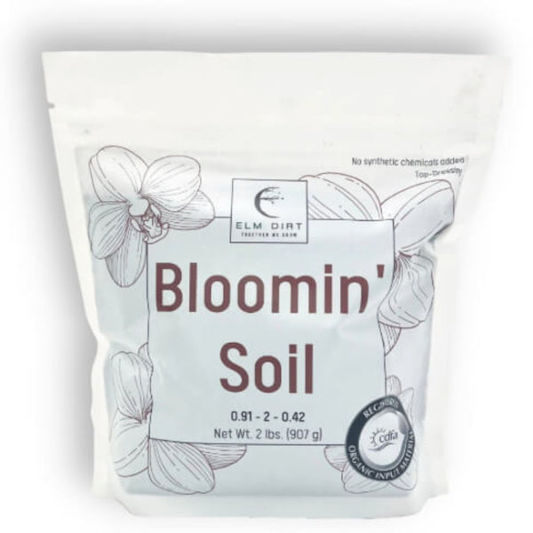 Package of 'Bloomin' Soil' with floral design and branding on a white background