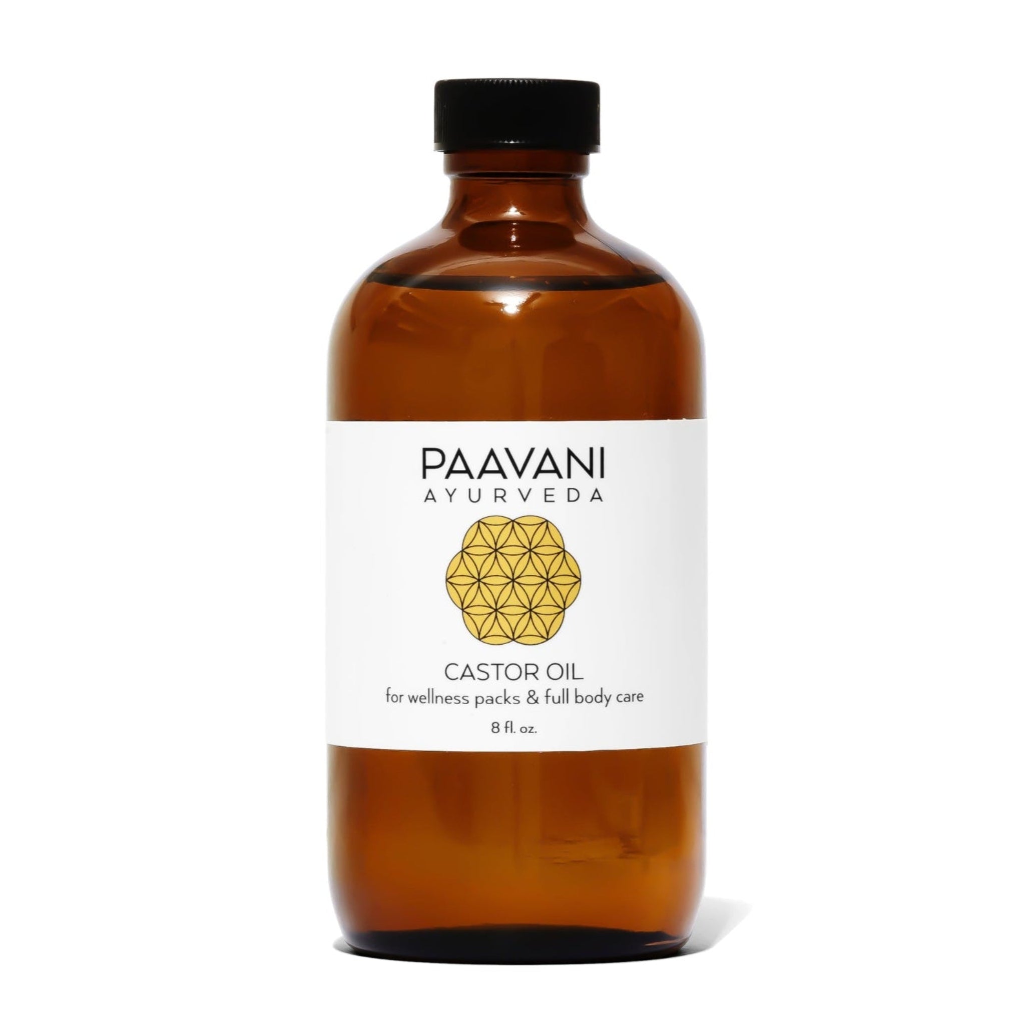 Brown bottle of Paavani Ayurveda Castor Oil with a white label on a white background