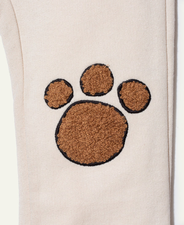 Close-up of recycled plastic bottle knee patch on Mon Coeur Paw Patch Baby Pants