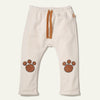 Mon Coeur Recycled Cotton Paw Patch Baby Harem Pants - front view in natural colour with contrast waist tape