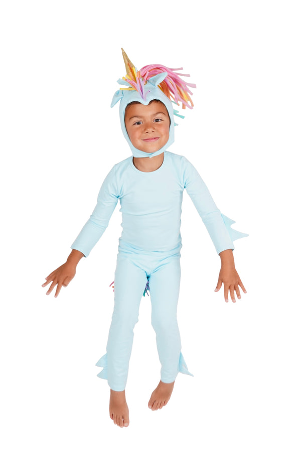 Child wearing a light blue unicorn costume on a white background