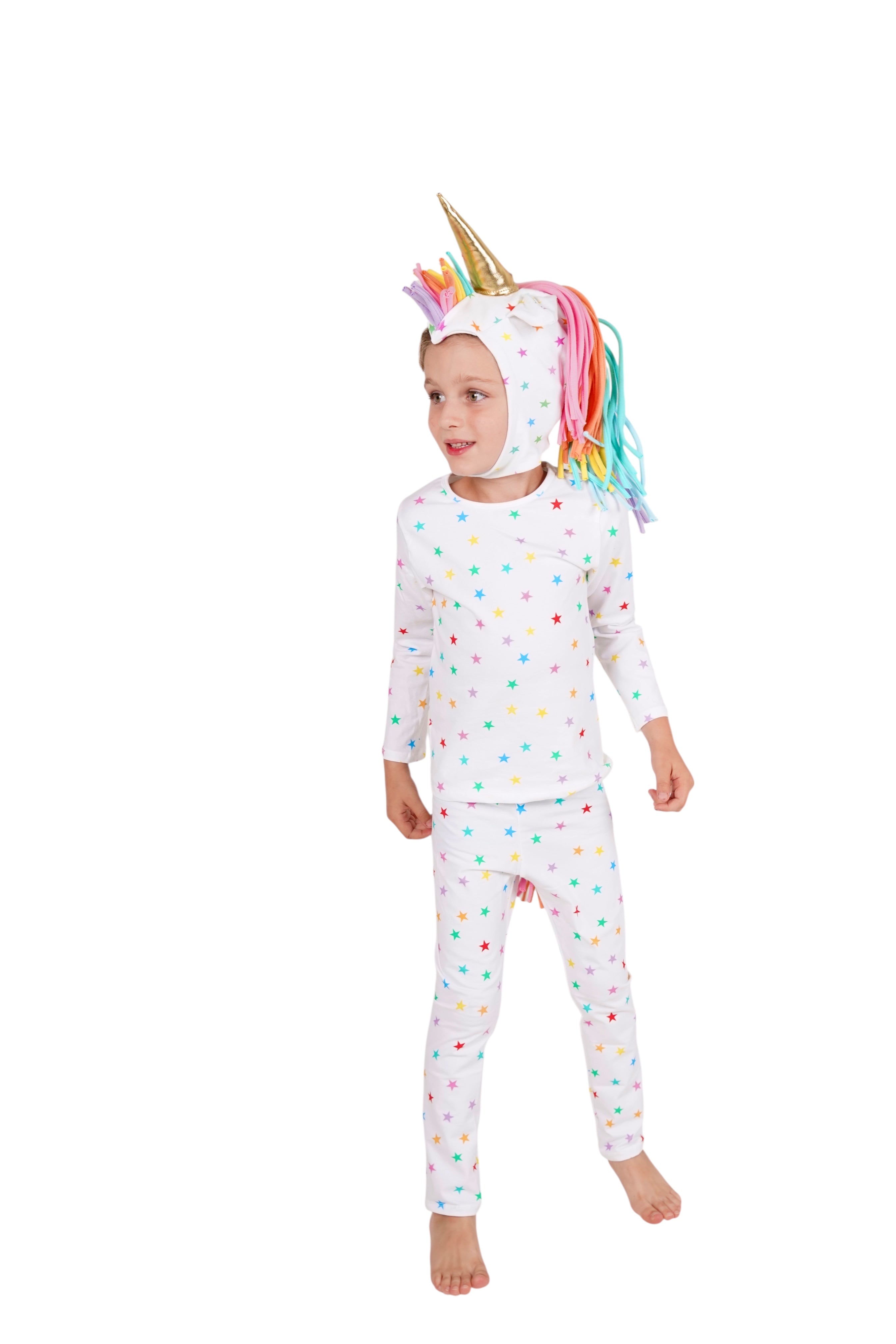 Child wearing a unicorn-themed outfit with a colorful mane and horn on a white background