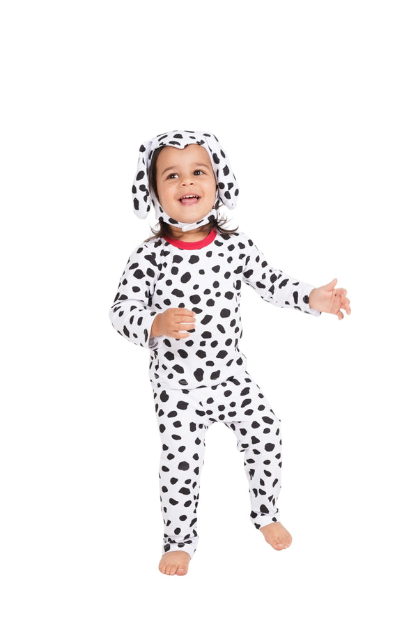 Child wearing a Dalmatian costume on a white background