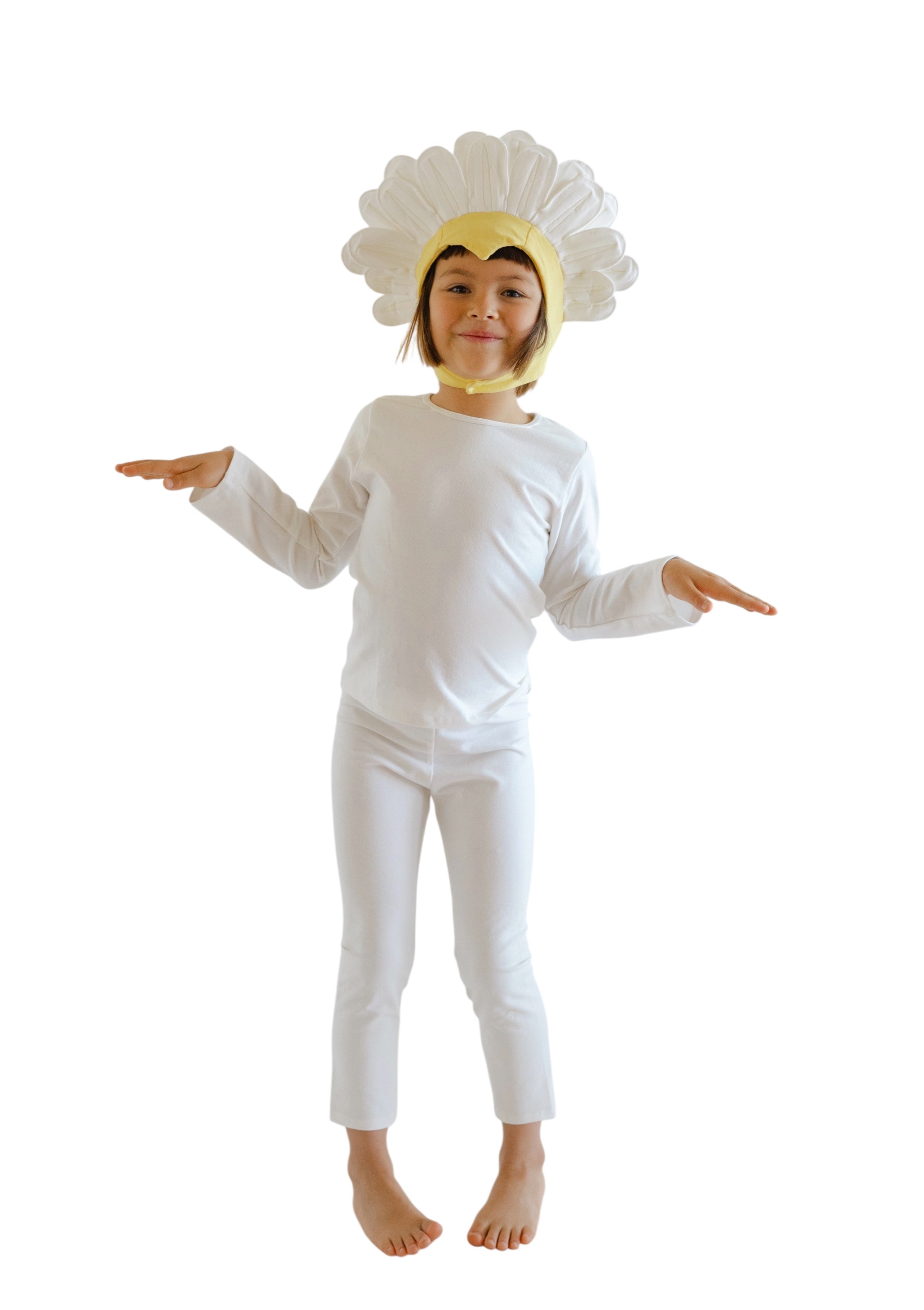 Child wearing a white bird costume with a yellow beak on a white background