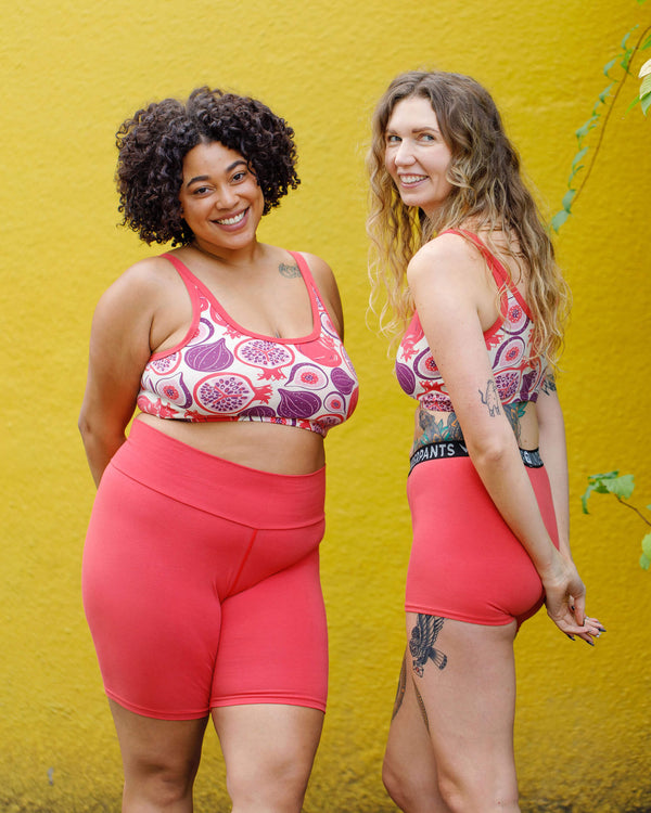 Model wearing Thunderpants Pomegranate Punch High Rise Bike Shorts, size LG, full length view