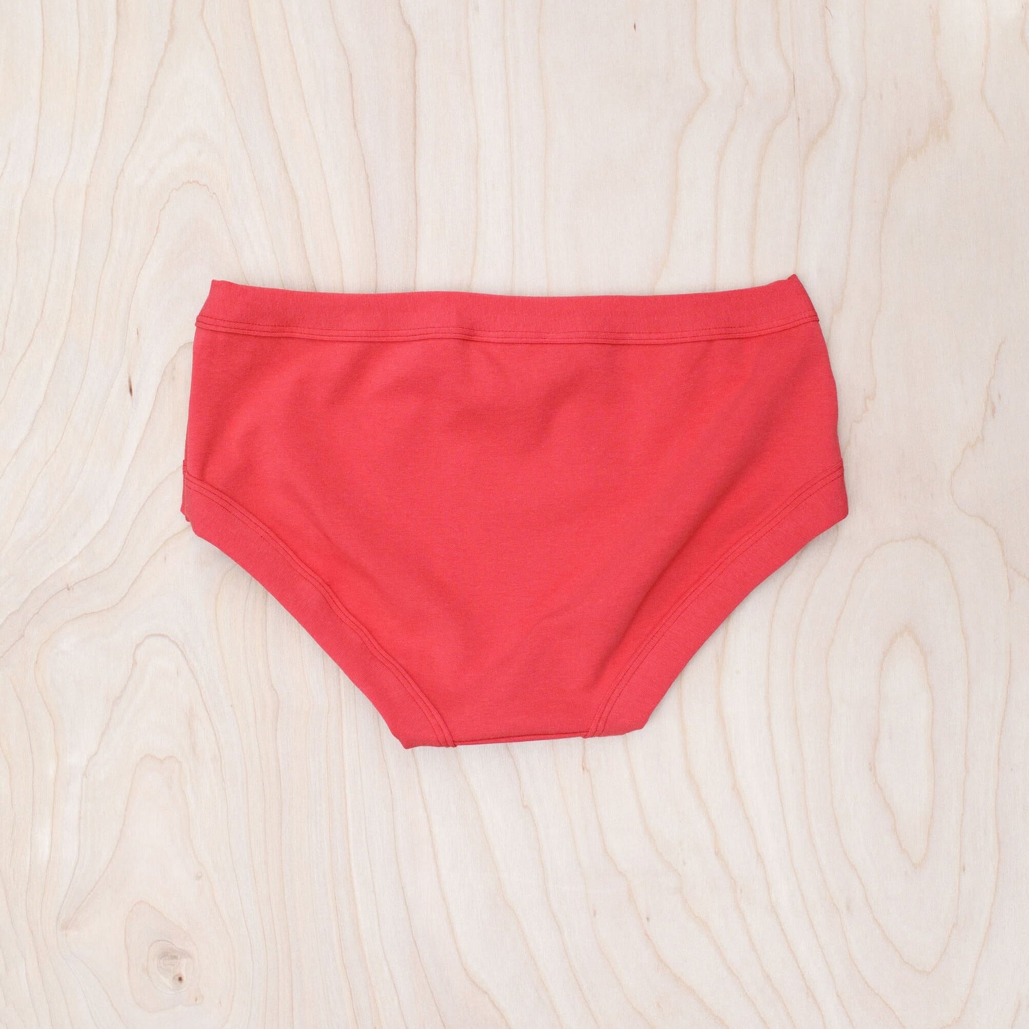 Thunderpants Women's Hipster in Pomegranate Punch coral-pink, lifestyle product shot