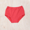 Woman wearing Thunderpants Original underwear in Pomegranate Punch limited-release colour, front view