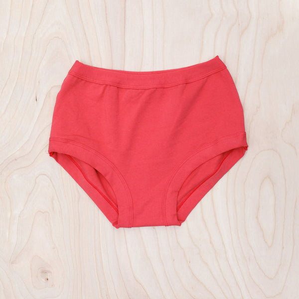 Woman wearing Thunderpants Original underwear in Pomegranate Punch limited-release colour, front view
