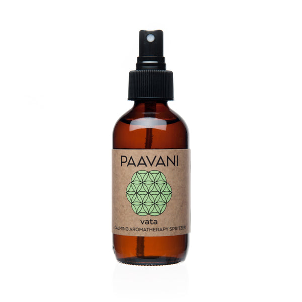Paavani glass bottle with a black spray nozzle and a brown label featuring 'Paavani' branding on a white background.