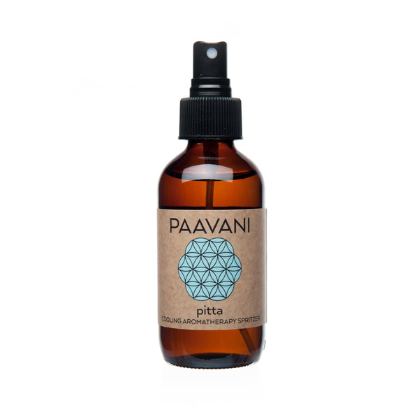 Brown spray bottle with a PAAVANI label on a white background