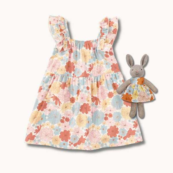 Organic cotton muslin flutter strap dress in Wildflower Picnic print with matching embroidered plush bunny by Apple Park & Organic Farm Buddies