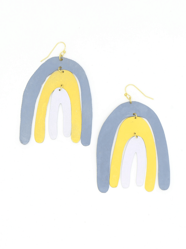 Pastel colourway of Fair Anita painted rainbow statement earrings — yellow, blue, and grey tones