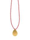 Red beaded brass pendant necklace by Fair Anita, handmade with recycled metal and glass beads