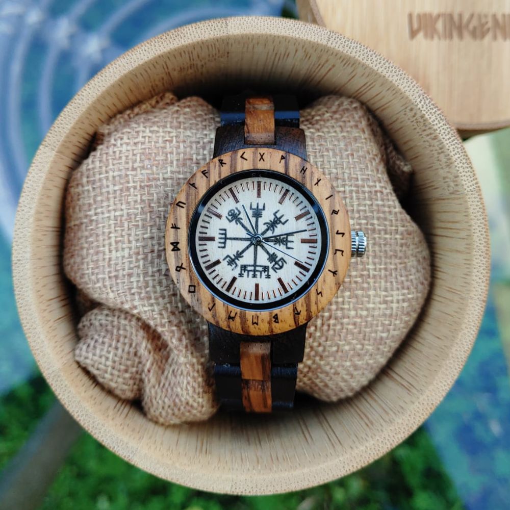 Close-up of Vegvisir and runic circle engraving on handmade women's wooden watch by Vikingenes