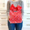 EverBag medium reusable eco-friendly gift bag with knitted sweater motif displayed alongside wrapped gifts