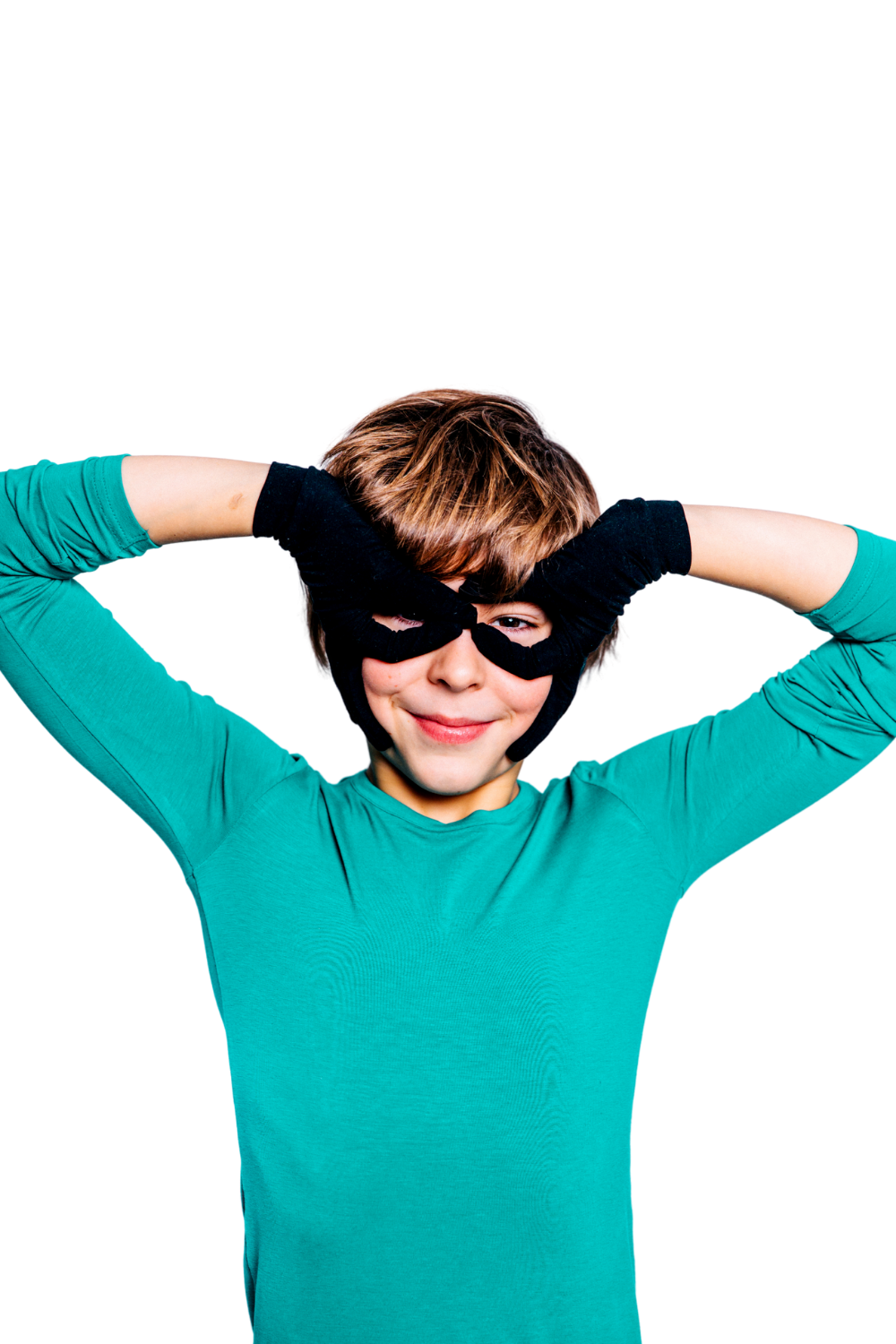 Child wearing a green superhero costume with a black mask on a white background. Remedywear kids eczema gloves with TENCEL & zinc oxide — dermatologist recommended, Oeko-Tex certified & made in Portugal. Soothe itchy skin day & night. Shop now.