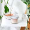 Close-up of Rose Clay Face Mask powder showing natural pink clay texture
