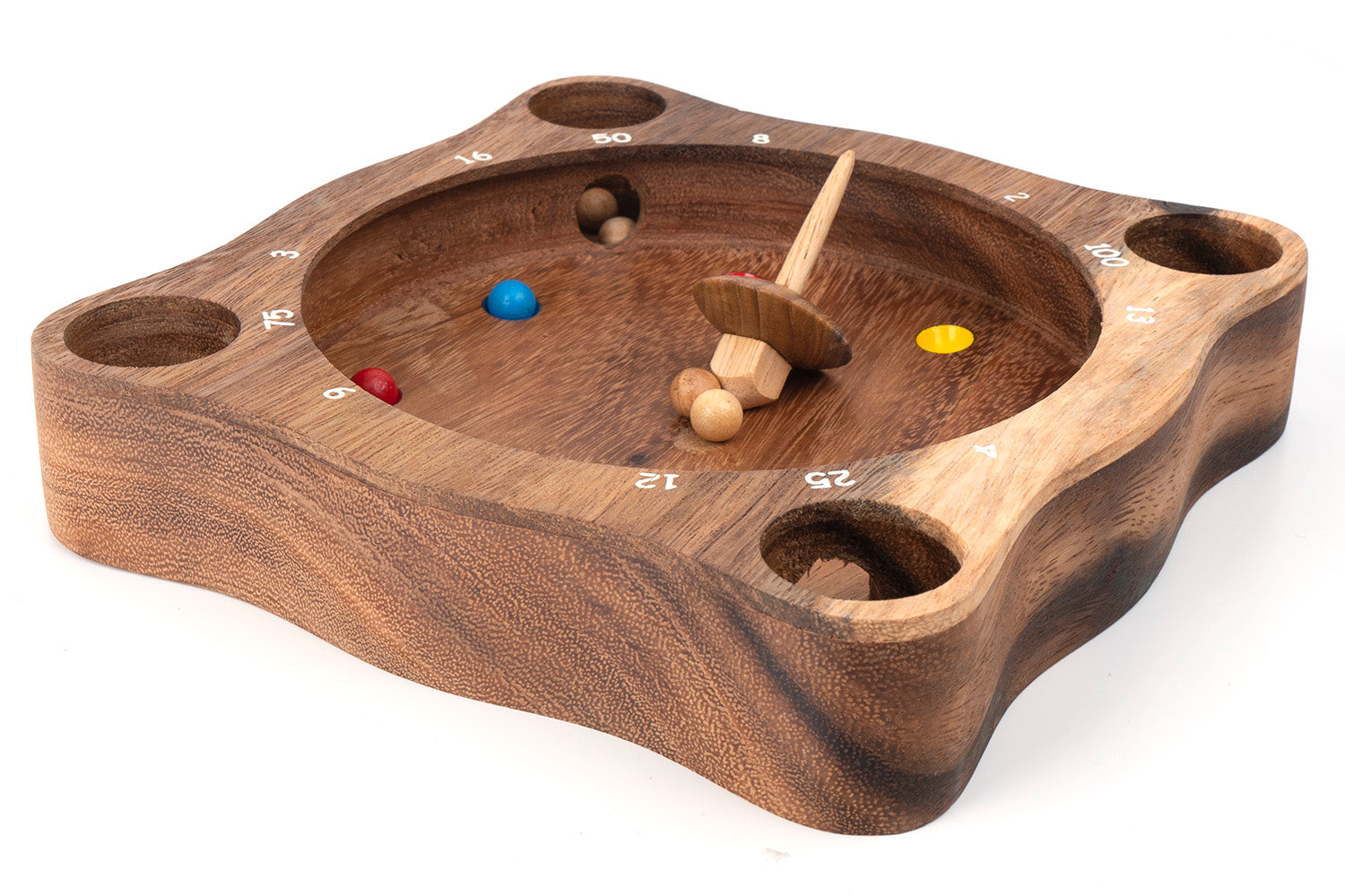 Wooden game board with numbered holes and colorful wooden balls on a white background