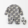 Baby wearing the Knitted Puppy Dog Jumpsuit from Ryan and Remi